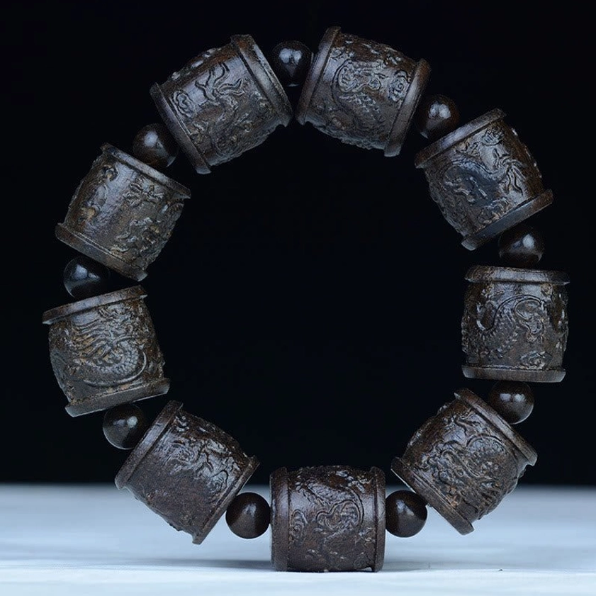 Dragon carved ebony wood Buddhist bracelet, 20mm beads with auspicious dragon symbols for strength and protection