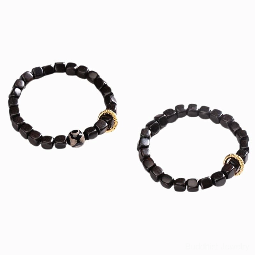Gift presentation of ebony wood and dzi bead bracelet, perfect for meaningful spiritual gifts to meditation practitioners and Buddhist jewelry lovers
