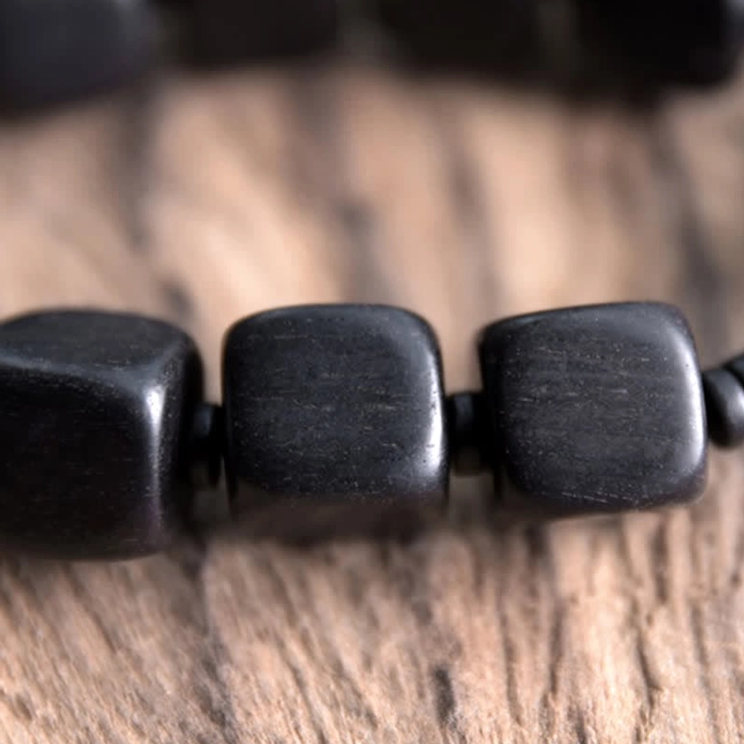 Ebony wood nine-eye dzi bead bracelet for meditation and spiritual protection practice