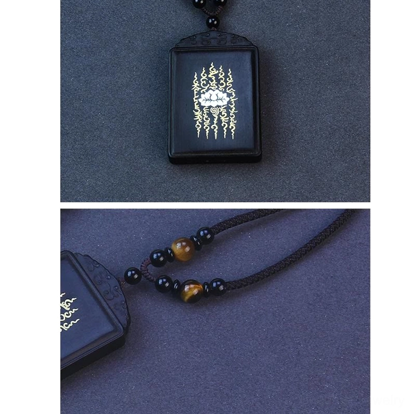 Ebony wood lotus pendant necklace side view showing black beaded cord with tiger's eye stone accents, Buddhist jewelry