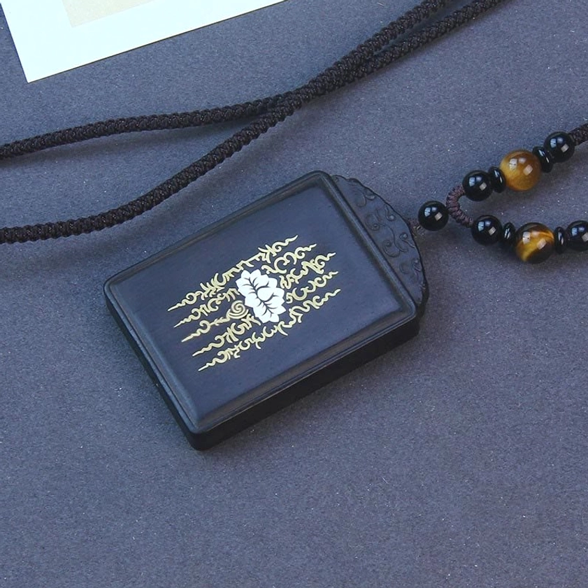 Sterling silver ebony wood lotus pendant necklace with black beaded cord and tiger's eye accents, handmade Buddhist spiritual jewelry