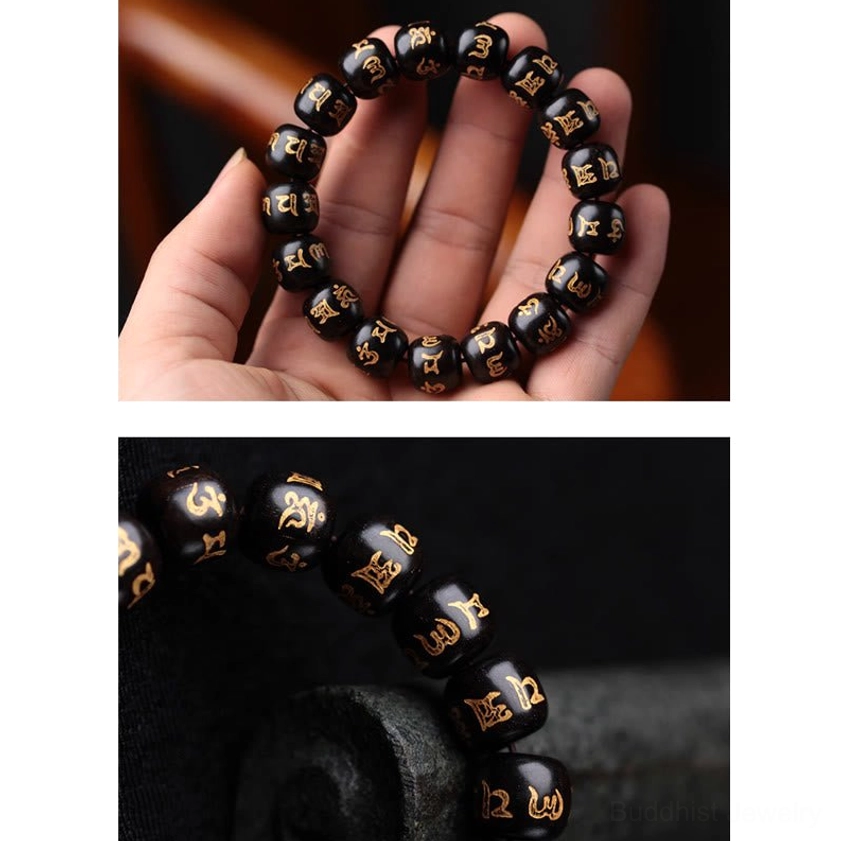 Full wear display of Om Mani Padme Hum ebony bracelet held in both palms showing natural wooden luster and spiritual quality