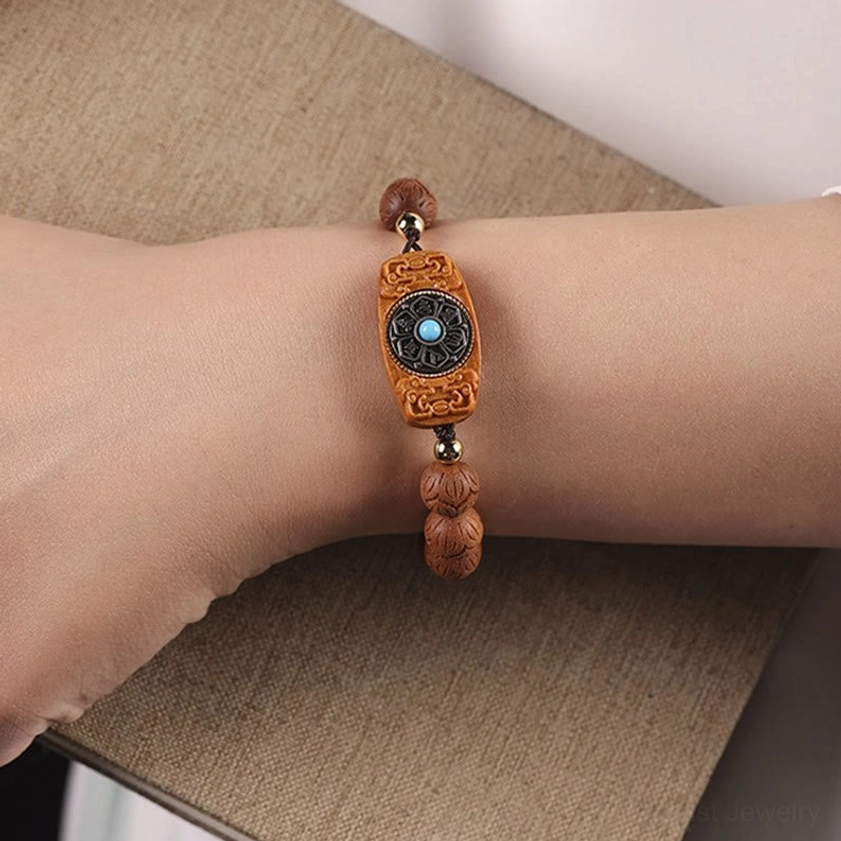 Ebony wood bracelet with balance and grounding spiritual properties, deep dark wood