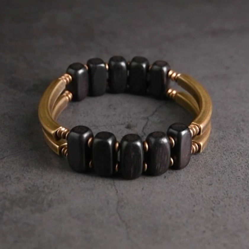 Handcrafted double-layer Buddhist bracelet featuring dark ebony wood oval beads connected by brass metal loops
