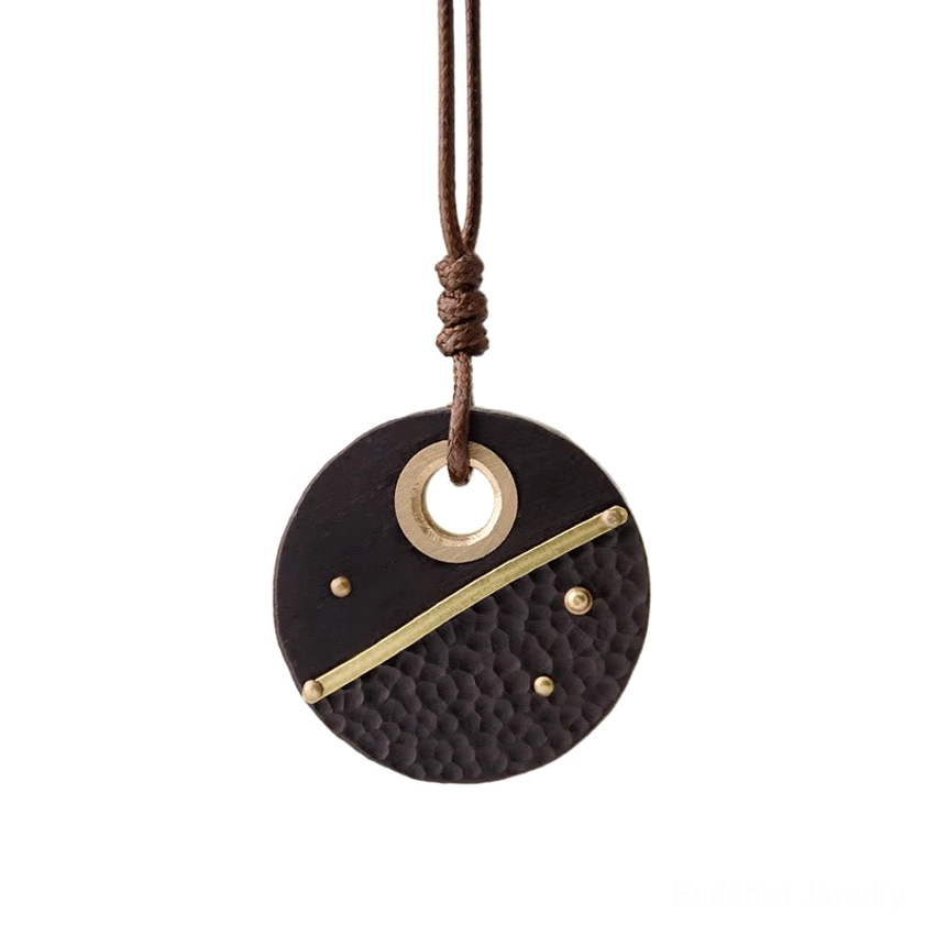 Handcrafted Buddhist ebony wood and brass peace pendant full necklace featuring natural wax cord and protective talisman design