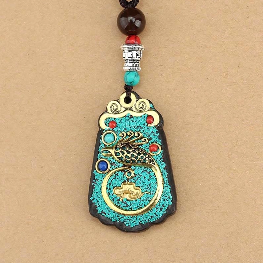 Ebony wood Buddhist pendant with protective spiritual properties - handcrafted meditation jewelry