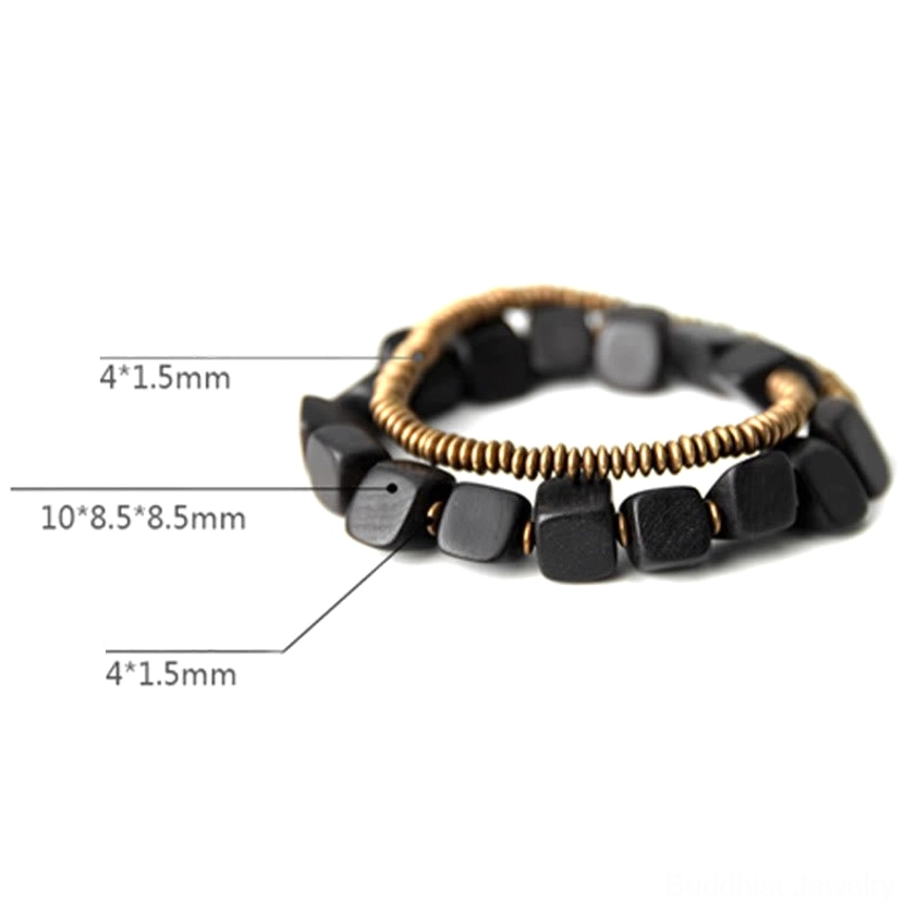 Ebony wood and copper bracelet with labeled bead size dimensions shown in flat lay on light background for reference