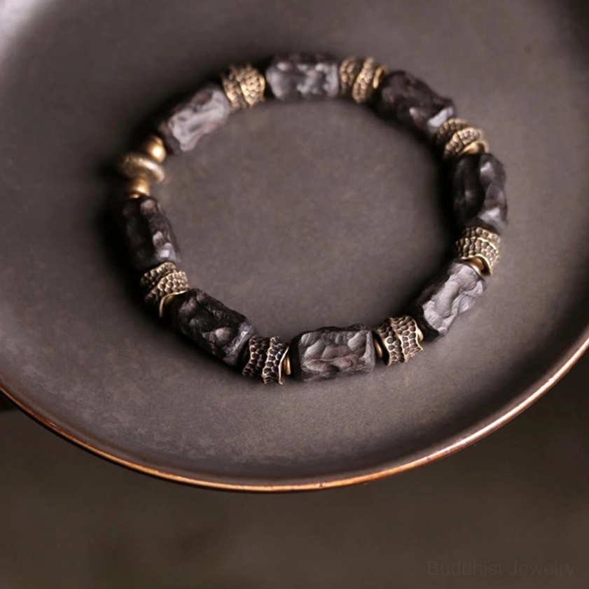 Full loop view of ebony wood copper Buddhist bracelet for peace and protection