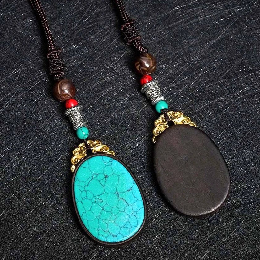 Ebony wood pendant necklace sizing reference showing adjustable cord length 51-80cm for Buddhist spiritual jewelry