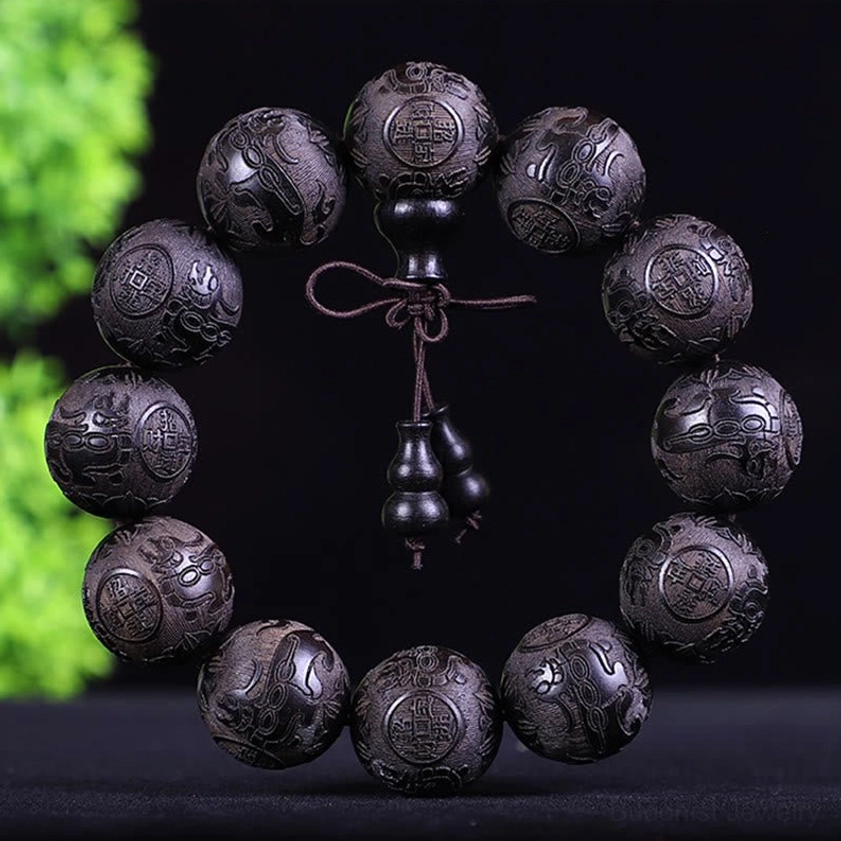 Black ebony wooden beaded bracelet with double gourd pendant and knotted cord, spiritual protection design