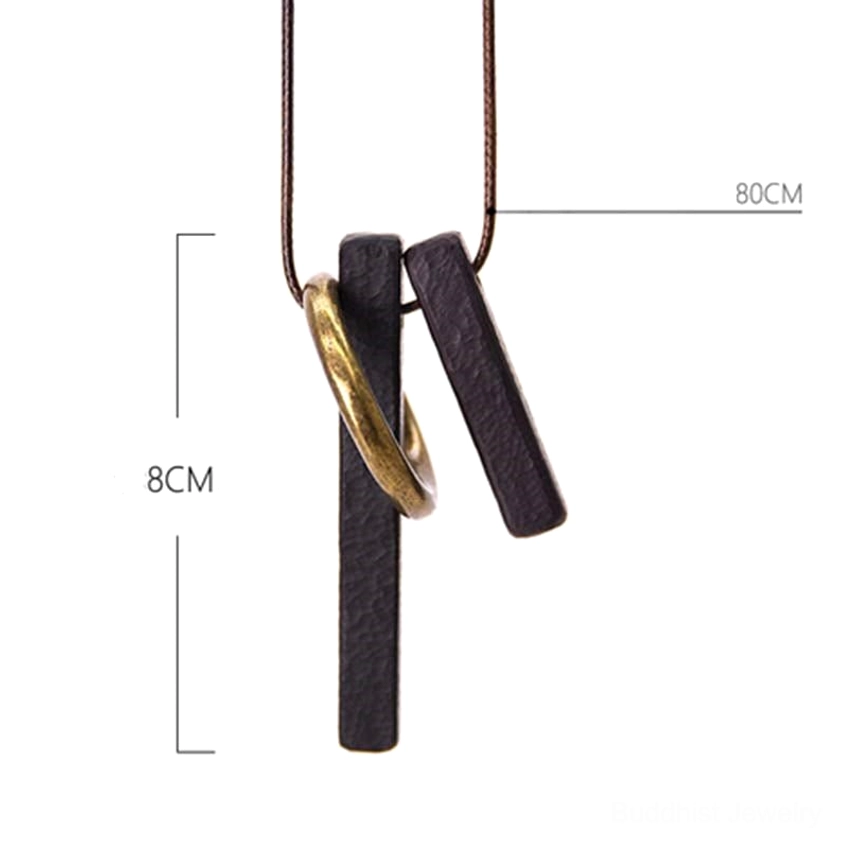 Ebony wood Buddhist Zen circle pendant lifestyle shot for meditation and spiritual practice