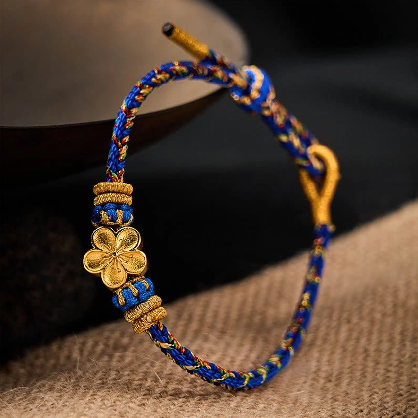 Eco-friendly Buddhist woven bracelet made with natural dyes and sustainable materials