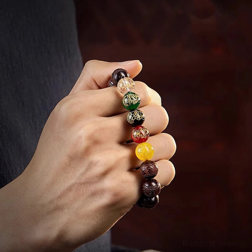 Sustainable eco-friendly Buddhist bracelet made from natural red sandalwood and gemstones