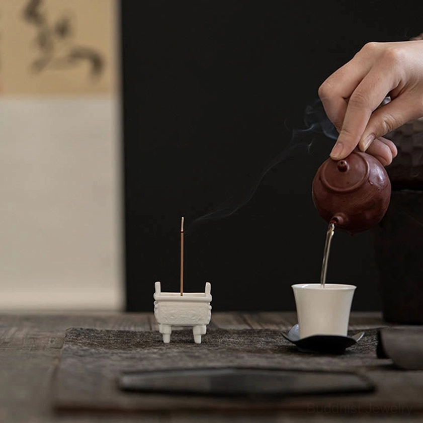 Eco-friendly handcrafted ceramic incense burner, matte finish with traditional Buddhist artistic carved details