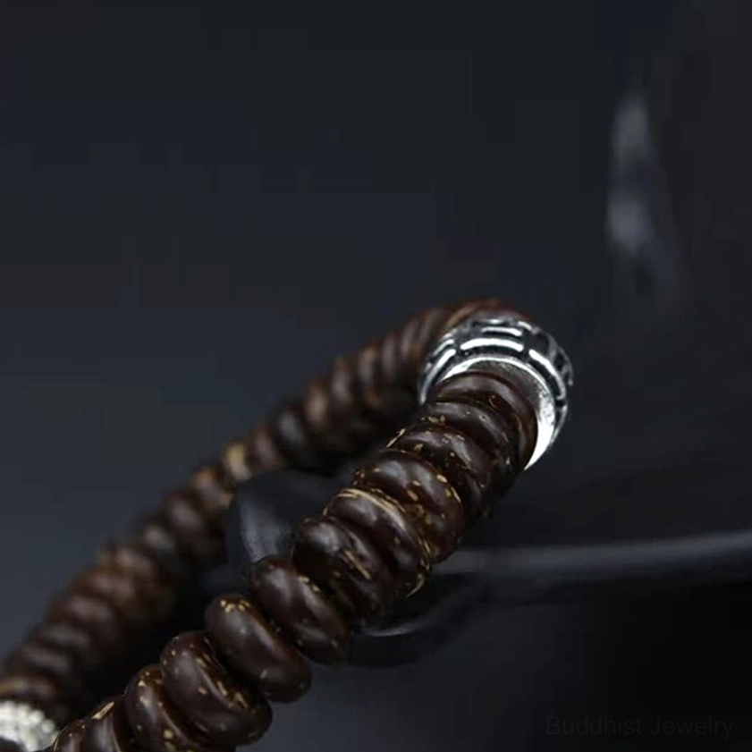 Eco-friendly coconut shell mantra bracelet for compassion, wisdom, and spiritual connection to Buddhist teachings