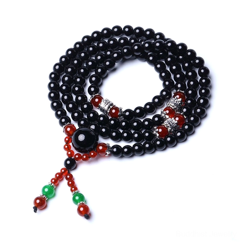 Eco-friendly handmade Buddhist mala bracelet with natural black obsidian and tiger eye stones for sustainable spirituality