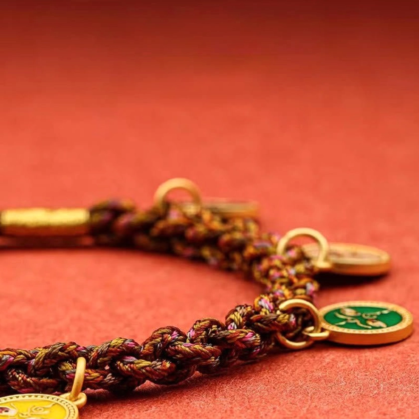 Five wealth deities braided bracelet crafted with natural eco-friendly materials and 14K gold accents