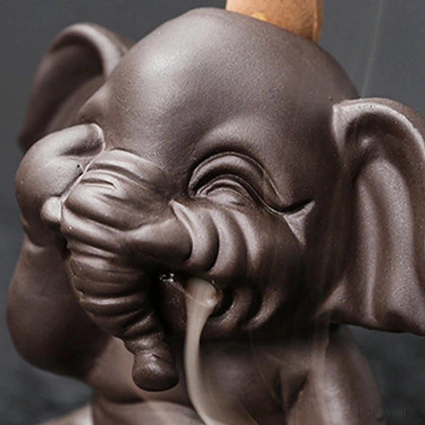 Handcrafted elephant backflow incense burner artistic detail shot showing ceramic texture and matte finish quality