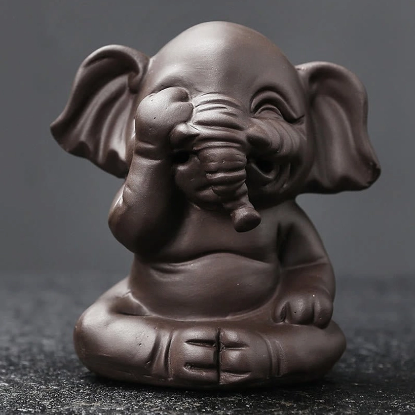 Elephant purple clay incense burner meditation practice guide product lifestyle photography peaceful space