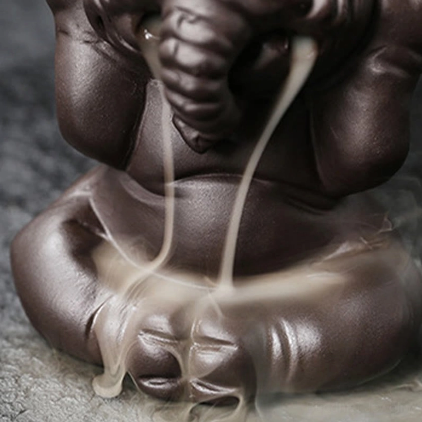 Elephant incense burner three mudra poses seated arrangement showing wisdom strength compassion symbolism