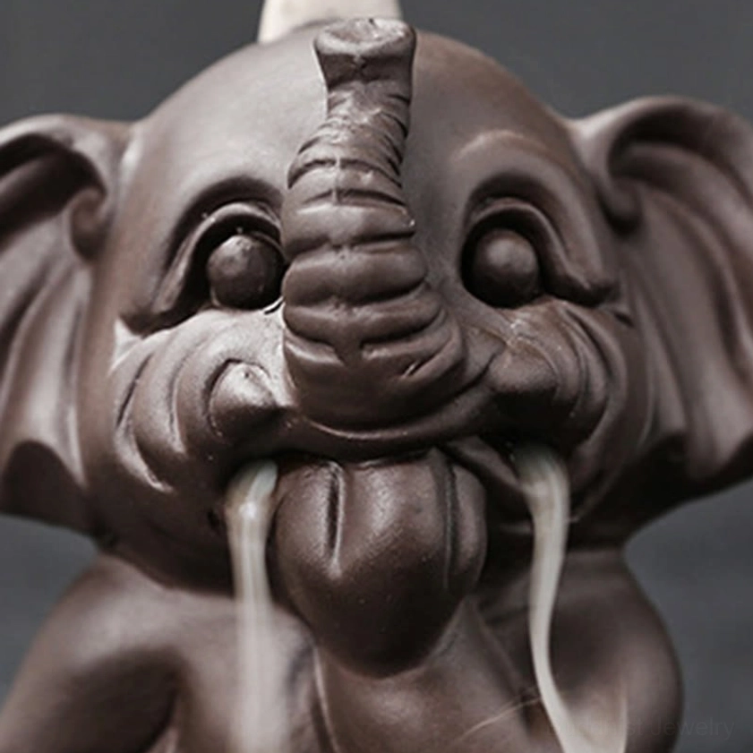 Elephant backflow incense burner three-quarter angle view showing complete form design and smoke direction