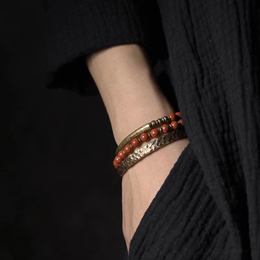 Embossed copper cuff bracelet with carved texture paired with red jasper beads - wrist styling for couples jewelry