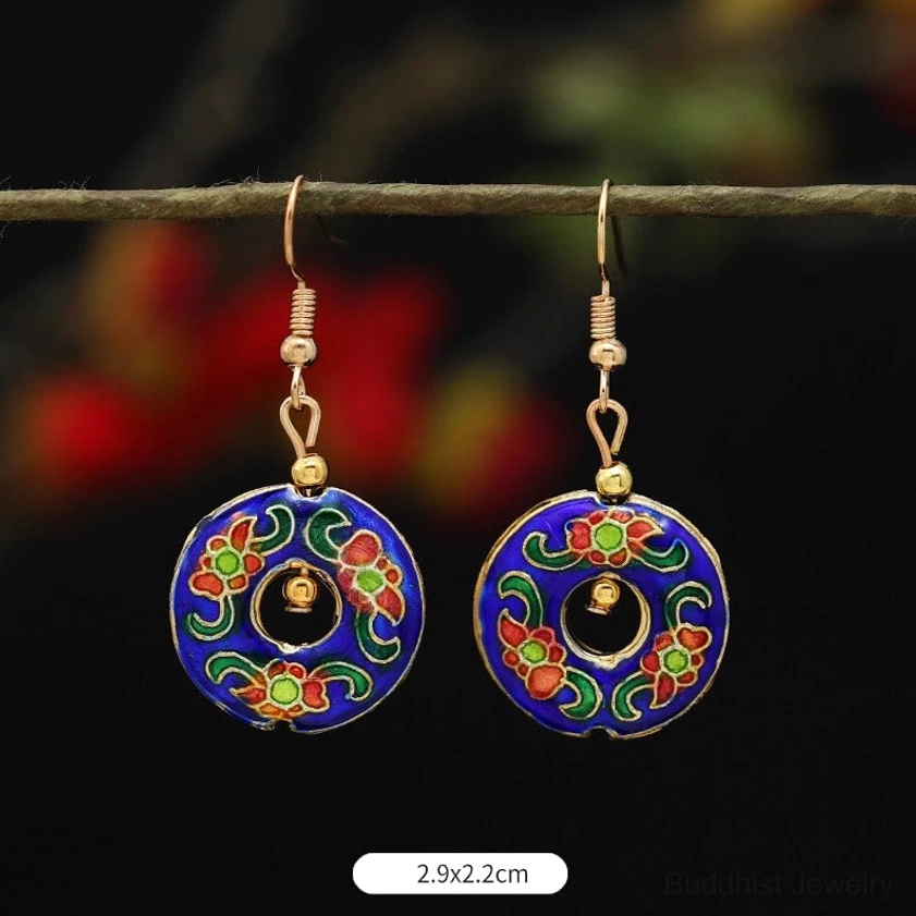 Buddhist enamel drop earrings close-up showing vibrant colors and copper frame quality