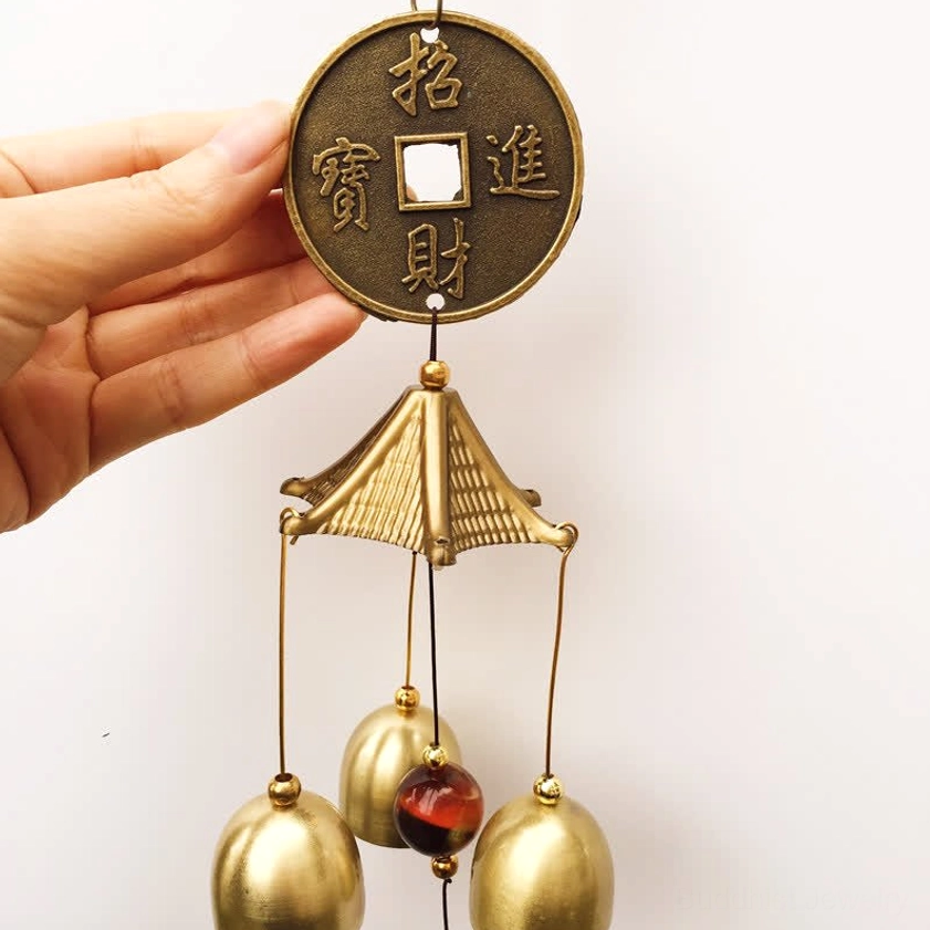 Feng shui blessing wind chime in home setting creating peaceful meditation space with gentle chimes