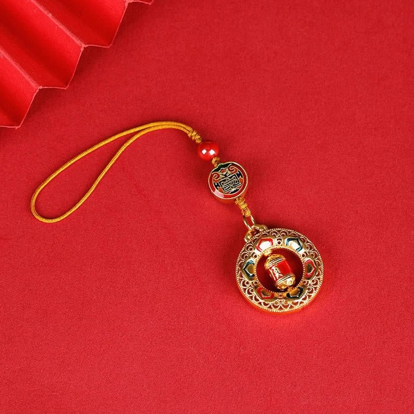 Five Directions Gods of Wealth prayer wheel keychain with thin braided hanging string and rotatable center wheel