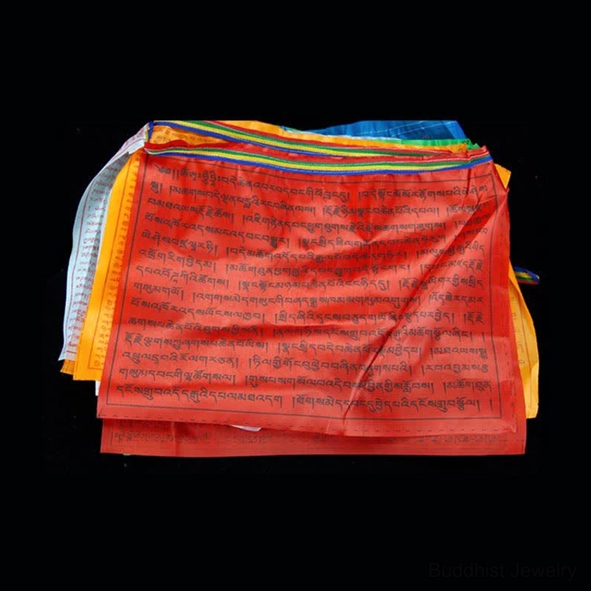 Five elements represented in Buddhist prayer flag colors blue white red green yellow with symbolic meanings