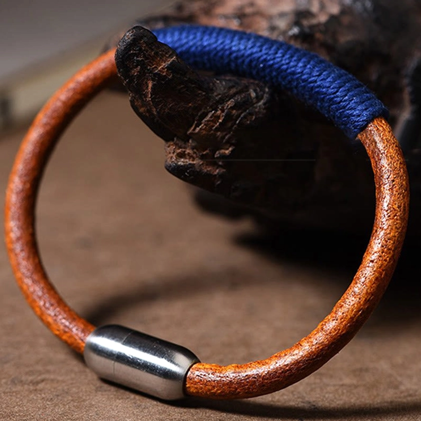 Five elements leather braided bracelet detail shot showing magnetic titanium steel closure mechanism