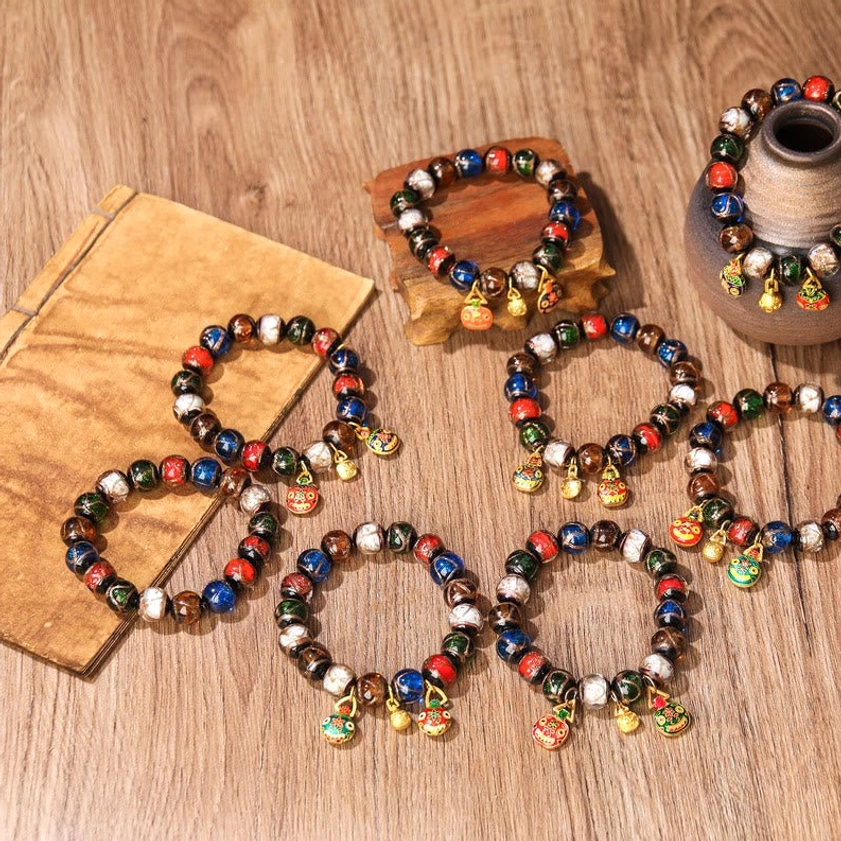 Five Elements Liuli glass bead bracelet detail shot showing individual bead quality and glazed glass finish – Buddhist spiritual jewelry