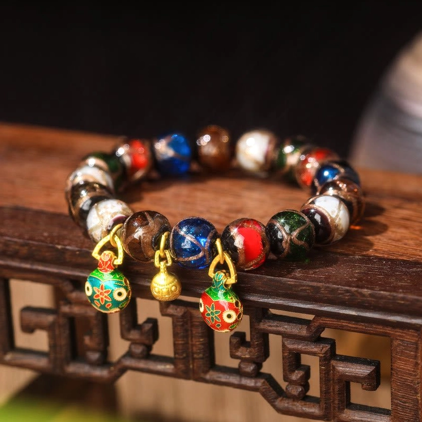 Five Elements Liuli glass bead Buddhist bracelet in three sizes – 10mm, 12mm, and 14mm bead options with copper gold swallowing beast accents