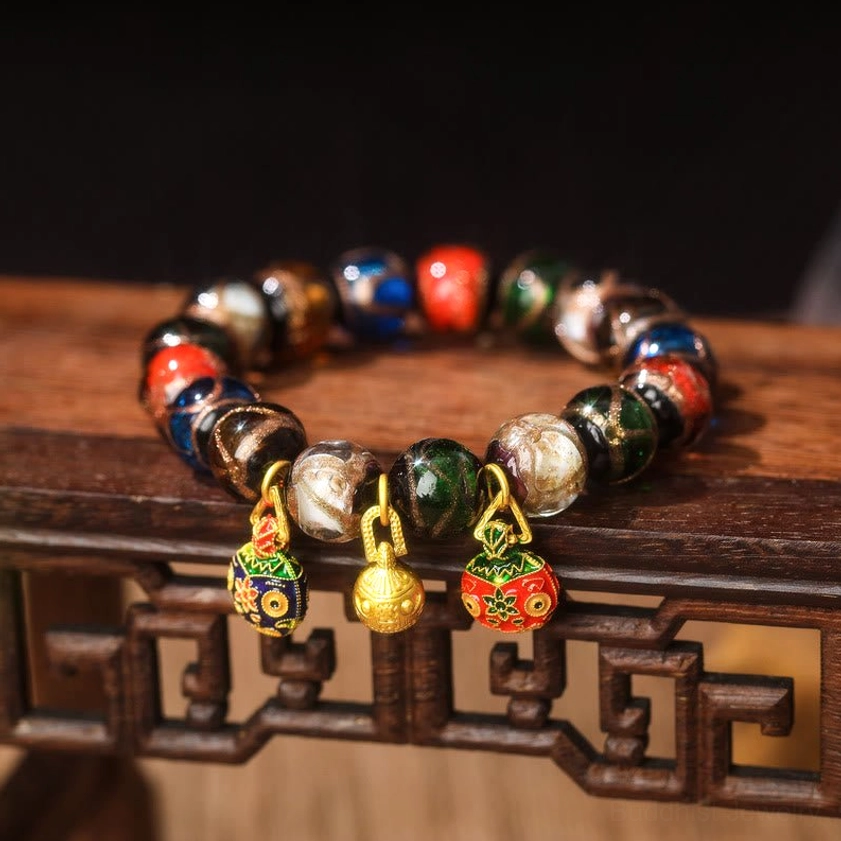 Five Elements Liuli glass bead luck bracelet with three distinct enamel pendants and small gold bell – alloy gold swallowing beast family