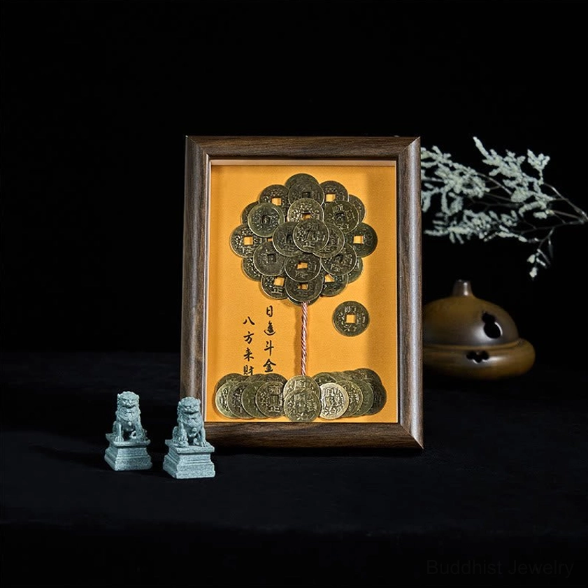 Feng Shui Five-Emperor Coins tree frame displayed in home setting with decorative stone lions and censer, three-quarter angle view