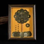 Five-Emperor Coins Tree Feng Shui wooden frame ornament front view, showing golden coin tree design with Chinese calligraphy backing and dark wood frame