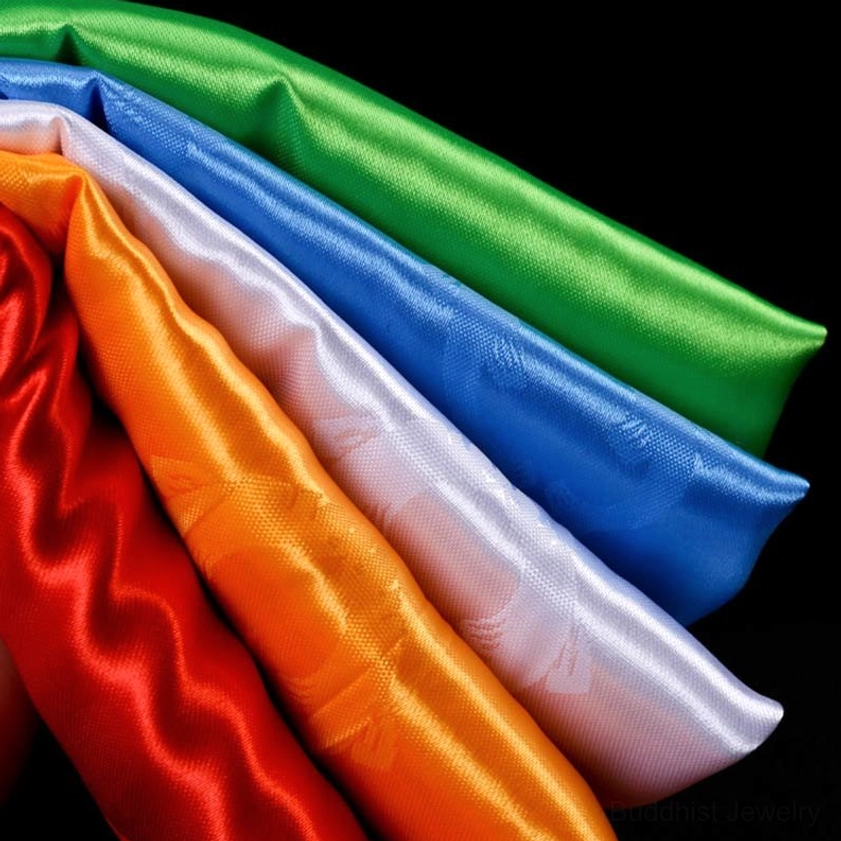 Five blessing khata scarves draped display showing elegant satin texture and how to wear or present ceremonially