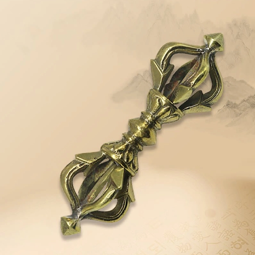 Complete five prong vajra dorje ritual tool in flat lay position showing full length and aged copper finish