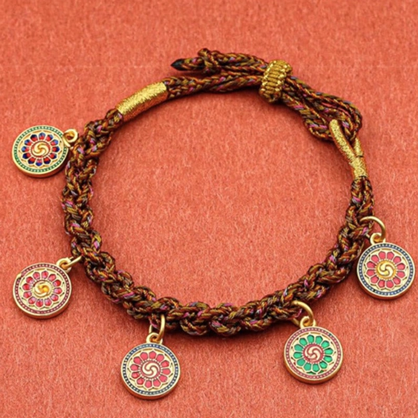 Five wealth deities bracelet with brown braided rope and gold accents displaying round floral enamel charms