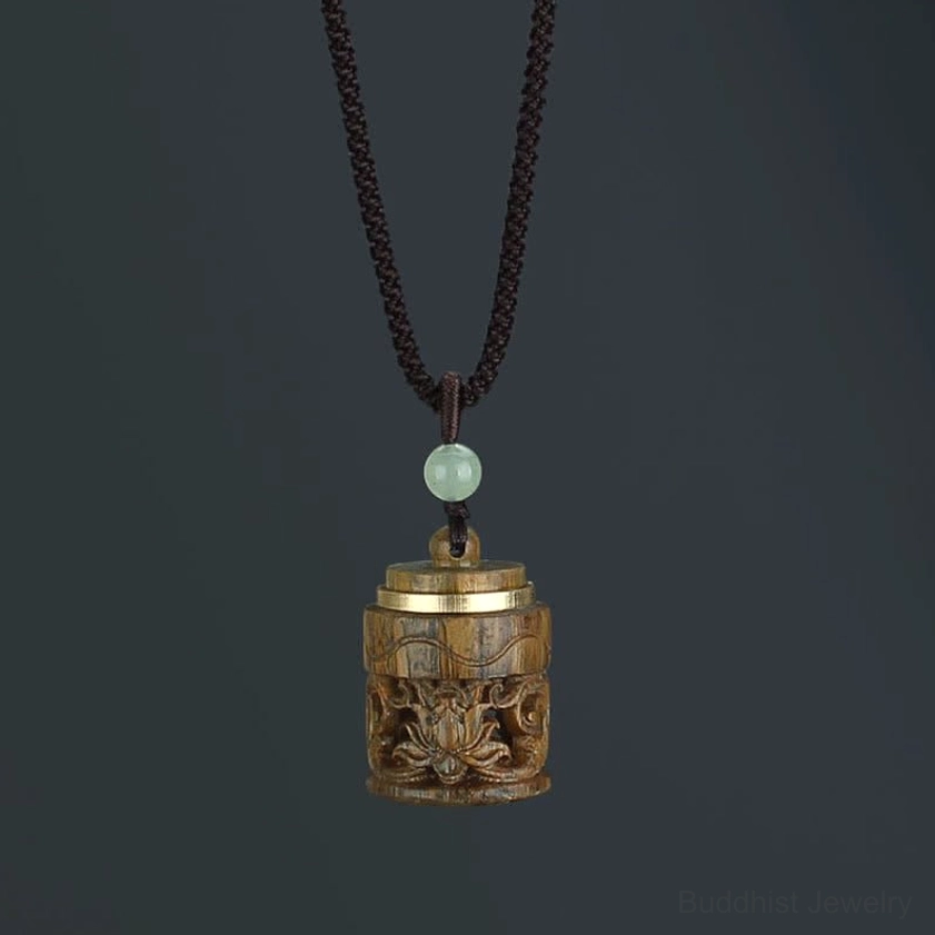 Flower green sandalwood Buddhist pendant necklace showcasing intricate floral carving and spiritual aesthetics on adjustable braided cord