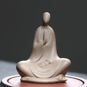 Formless Buddhist ceramic meditation statue brown - front view showing prayer hands and seated pose