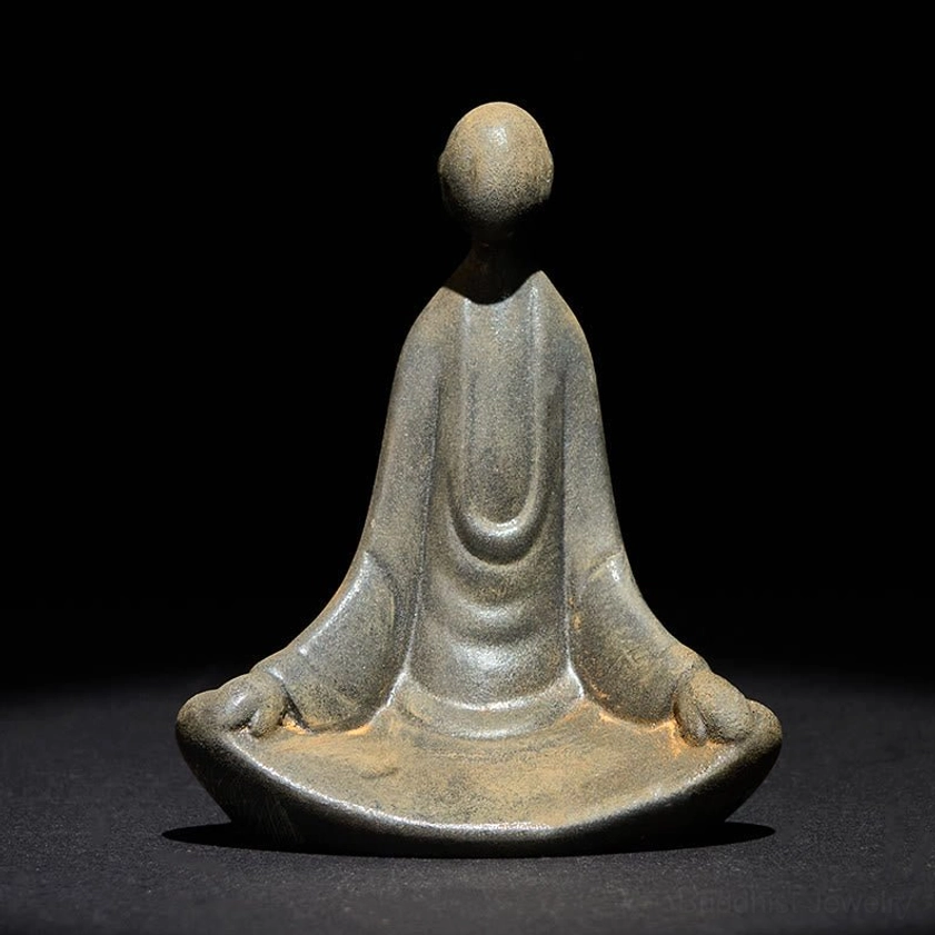 Formless Buddha decoration front silhouette with weathered rust-gray finish direct front angle