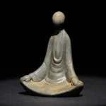Handmade formless Buddha meditation statue front view with rust-gray iron powder resin finish on dark background