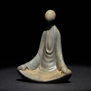 Handmade formless Buddha meditation statue front view with rust-gray iron powder resin finish on dark background
