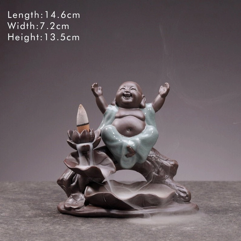 Fortune Buddha ceramic backflow incense burner with size reference, studio product shot showing brown ceramic construction and celadon-glazed Buddhist figure, backflow incense effect