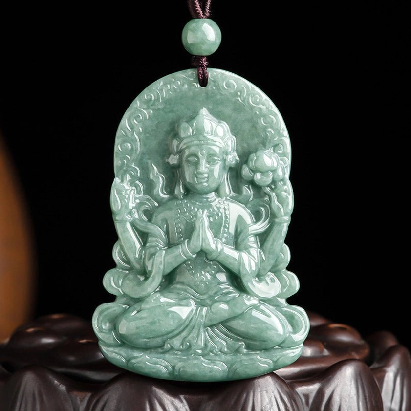 Four-armed Avalokitesvara natural jade pendant necklace front view with hand-carved relief detail