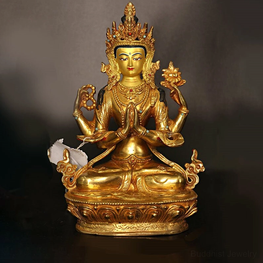 Four-armed Avalokitesvara gilt copper bodhisattva statue front view with ritual mudras