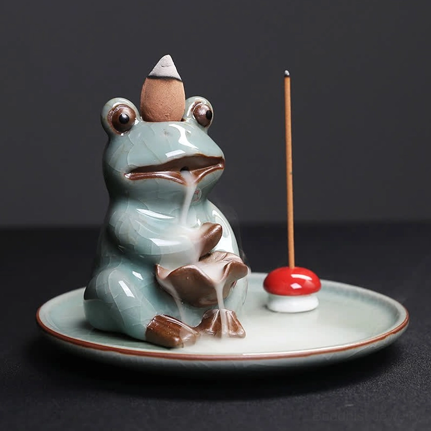 Three-quarter side view of ceramic frog incense burner highlighting crackle glaze finish and traditional pottery craftsmanship on backflow design