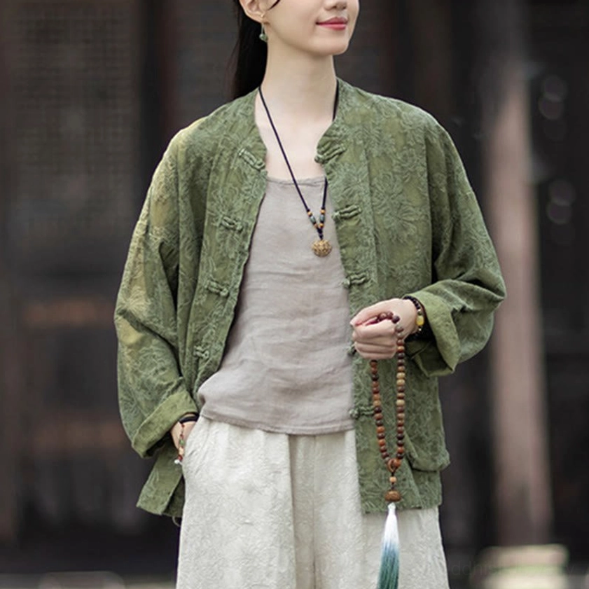 Overhead detail of frog button closures on women's zen meditation shirt with traditional Chinese knot design