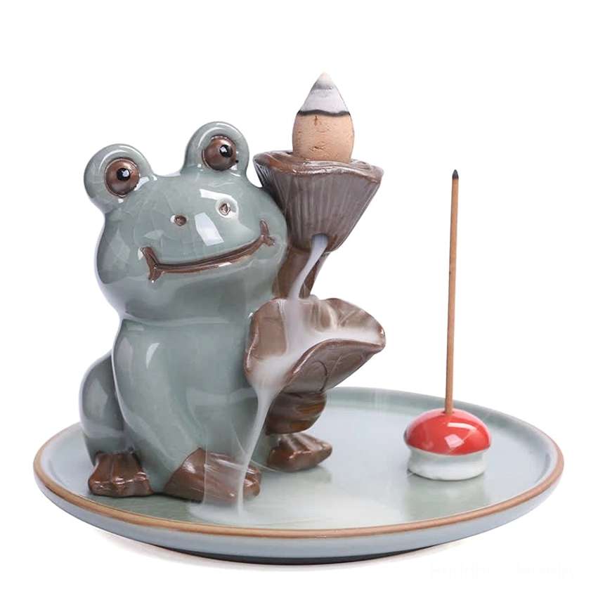 Closeup of handcrafted ceramic frog incense burner on white background displaying authentic crackle glaze texture and artisanal pottery details